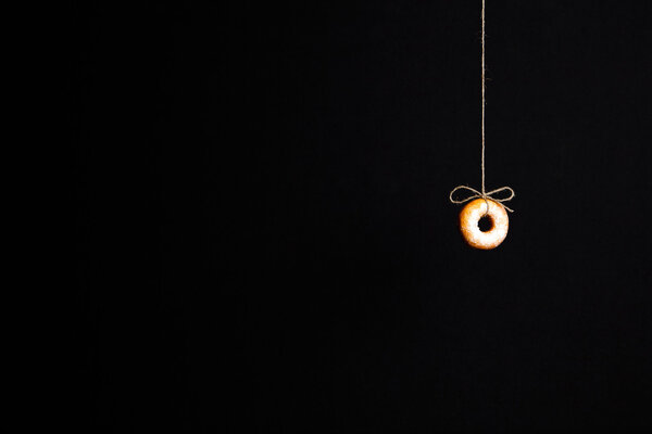 Fresh donuts on black background