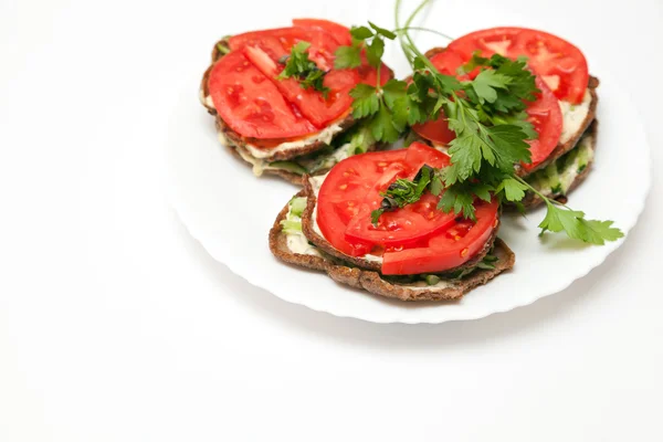 Liver meat cutlets with tomatoes and cucumbers over a white background — Stock Photo, Image