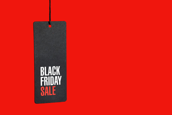 Черная пятница. Торговая марка на красном фоне
