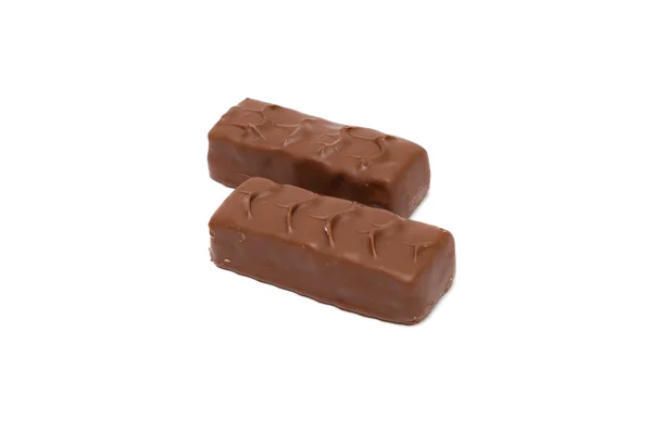 Barras de chocolate con tuercas aisladas sobre fondo blanco — Foto de Stock