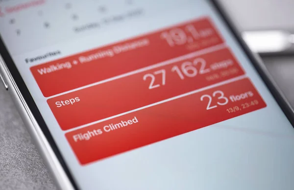 Apple iPhone with Health app Walking, Running Distance, Steps and Flights Climbed on the screen. Apple Inc. is an American multinational technology company. Moscow, Russia - September 16, 2020