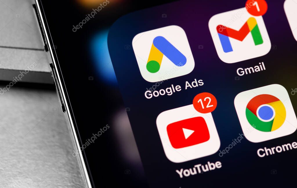 Google Ads, Gmail, YouTube, Chrome icon apps on screen iPhone closeup. Google Ads is a service of contextual, basically, search advertising from Google. Moscow, Russia - November 28, 2020