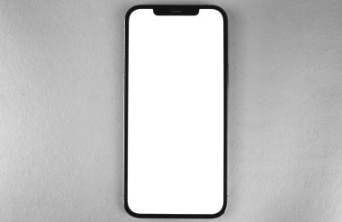 Akıllı telefon modeli iPhone 12 Pro Max, beyaz ekran, üst görünüm. Apple çok uluslu bir teknoloji şirketidir. Moskova, Rusya - 15 Ocak 2021