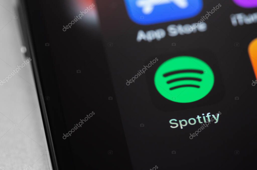 Spotify mobile icon app on screen smartphone iPhone closeup. Spotify - online streaming audio service. Moscow, Russia - January 23, 2021