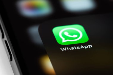 WhatsApp mobile icon app on screen smartphone iPhone macro. WhatsApp is a popular free instant text messaging system for mobile and other platforms. Moscow, Russia - June 15, 2021