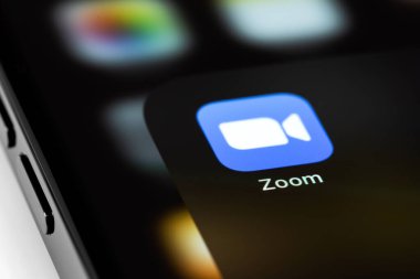 Zoom mobile icon app on screen smartphone iPhone macro. Zoom Video Communications is a company that provides remote conferencing services. Moscow, Russia - June 15, 2021