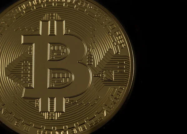 Bitcoin coin on black background — Stock Photo, Image