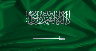 Kumaş kaplamalı Suudi Arabistan bayrağı. Gerçekçi desenli Suudi Arabistan bayrağı
