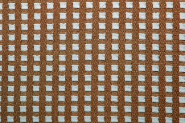 Strickstoff mit quadratischen Mustern, gestrickte Wolltextilien, — Stockfoto
