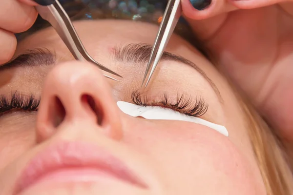 eyelash extension process, the beauty industry beauty salons lashes  very soft focus