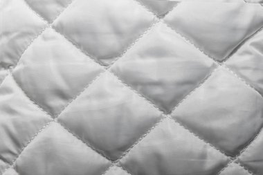 quilted fabric texture of white color for hammering,   clipart