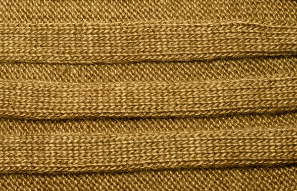 Brown ribbels breien wol als textuur, geweven gebreide stoffen-je — Stockfoto