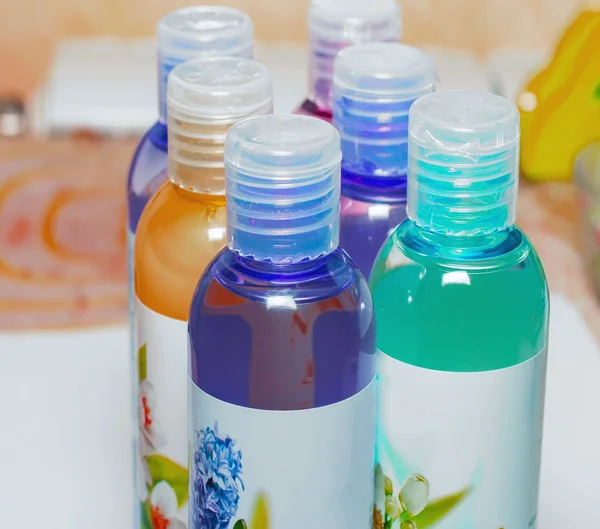 Group cosmetic bottles, cosmetic liquid, shower gels, shampoos, — Stock Photo, Image