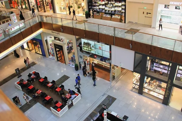 Dubai Mall, a top view of the inside, boutiques and shops, peopl — ストック写真