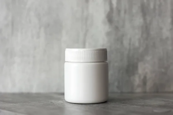 Empty Cosmetic Plastic White Cream Jar Gray Background Container Cosmetics — Stock Photo, Image