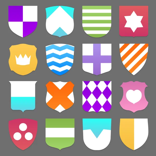 Conjunto de coloridos escudos — Vector de stock