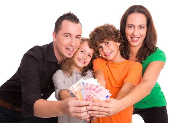 Молодая семья с деньгами в руках — стоковое фото