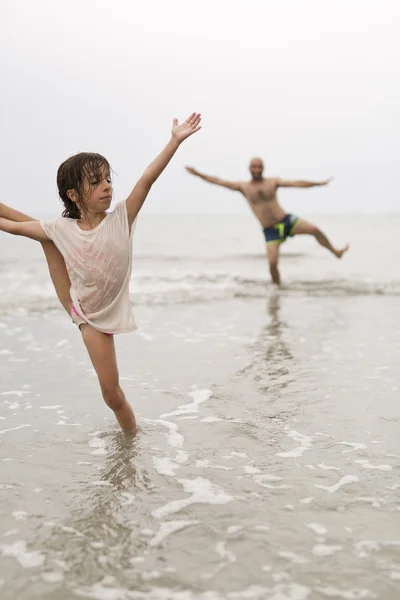 Girl in the water of a beach