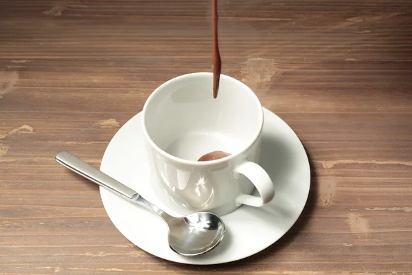 Чашка жидкого шоколада и чуррос — стоковое фото