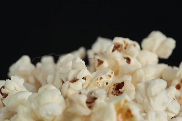 Popcorn v hodně — Stock fotografie