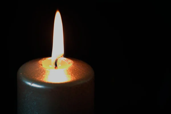 Candle on dark background — Stock Photo, Image