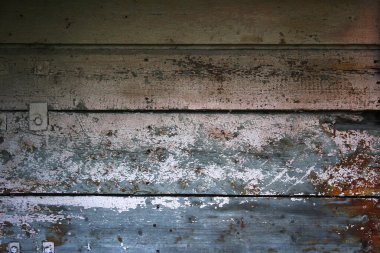 Eski, yıpranmış, gri tahta yüzey.