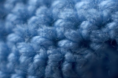 Seçici odak makro görüntüsü olan mavi yün dokusu