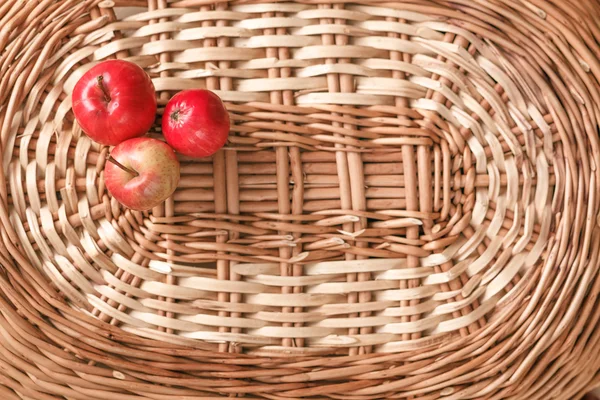 autumn small apples in a wicker basket a place for an inscription