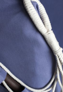 dinlenmek ve izole bir beyaz arka plan üzerinde seyahat bir hamak