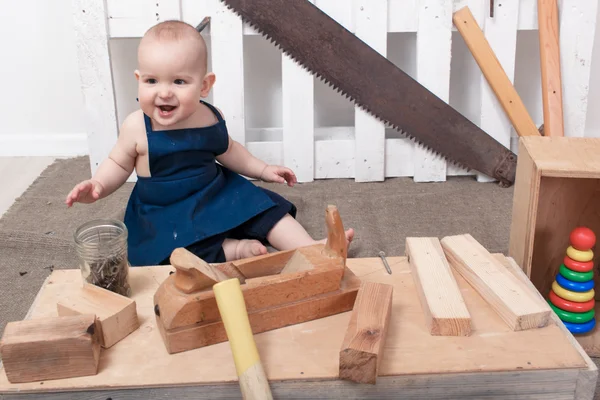 The small child with a plane Carpenter — Stock Photo, Image