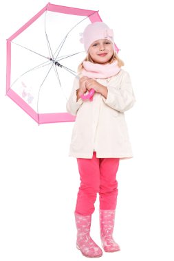 Little cute girl with an umbrella in the colorful dress isolated on white background space for inscriptions