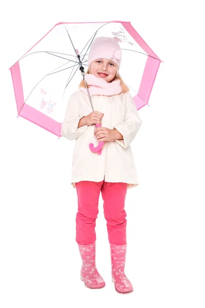 Little cute girl with an umbrella in the colorful dress isolated on white background space for inscriptions — Stock Photo, Image