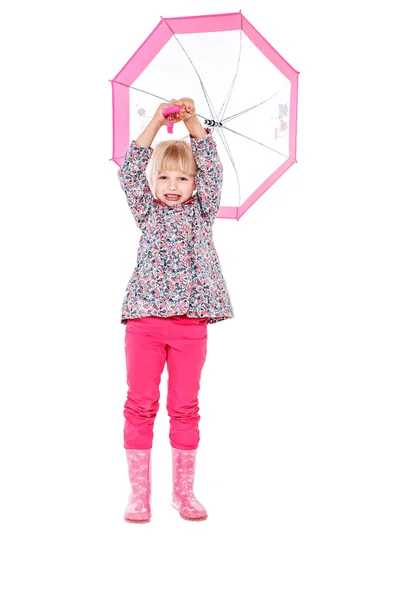 Little cute girl with an umbrella in the colorful dress isolated on white background space for inscriptions — Stock Photo, Image