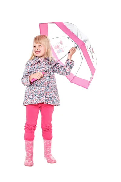 Little cute girl with an umbrella in the colorful dress isolated on white background space for inscriptions — Stock fotografie