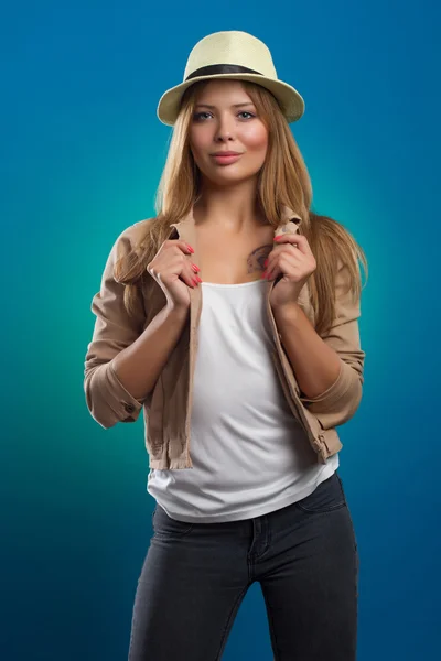 Portrait of beautiful woman with straw hat. Stock Photo