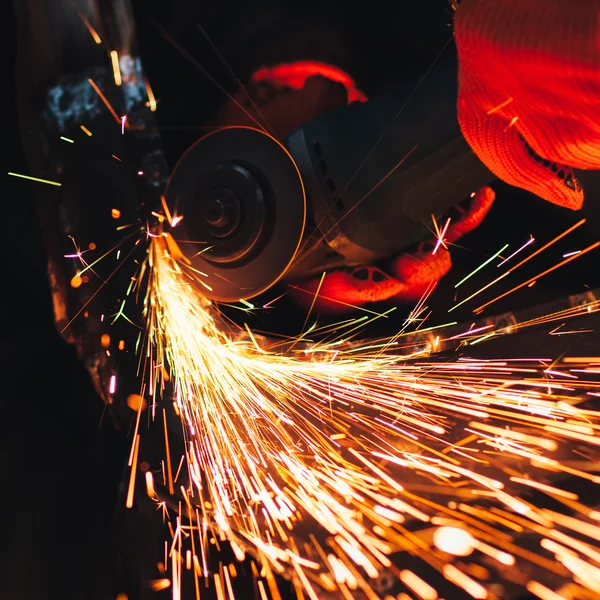 Angel grinder make a flash sparks — Stock Photo, Image