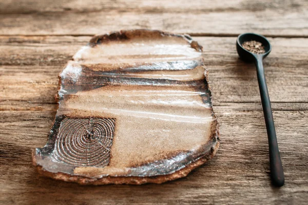 Empty rustic handmade eco friendly pottery plate — Stockfoto