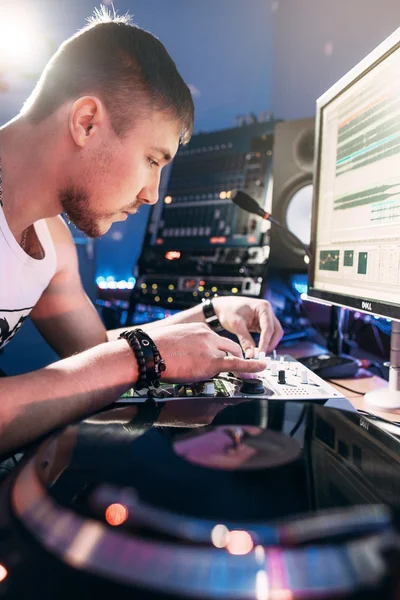 DJ making music in the recording studio Stock Image