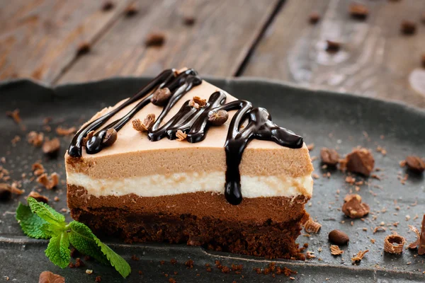 Peace of layered sweet chocolate souffle dessert — Stock Photo, Image