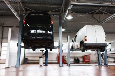 Auto service maintenance for minibuses, workshop clipart