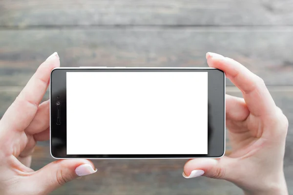 Imagen de toma de fotos en el teléfono inteligente, fondo de madera — Foto de Stock