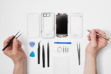 Tamirci işyeri telefon ve araçları ile