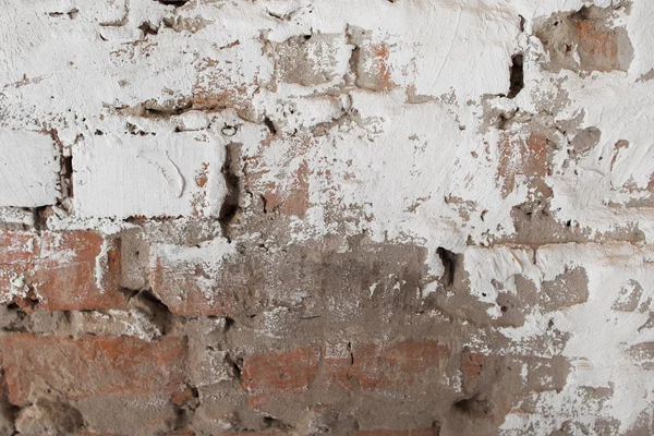 Oude bakstenen muur met gips achtergrond — Stockfoto