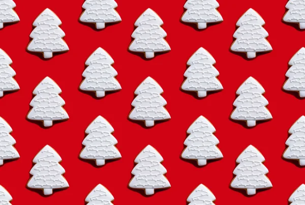 白いクリスマスツリーのパターン赤シームレスな背景 — ストック写真