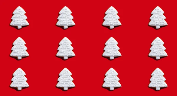 赤いクリスマスの背景シームレスモミの木のパターン — ストック写真
