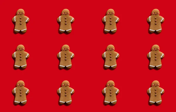 gingerbread man pattern red seamless background