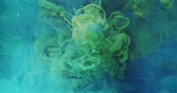 Tinte Wasser Mix bunt Nebel fließen blau grün Tropfen — Stockvideo