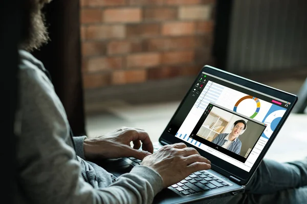 video call virtual conference man working laptop
