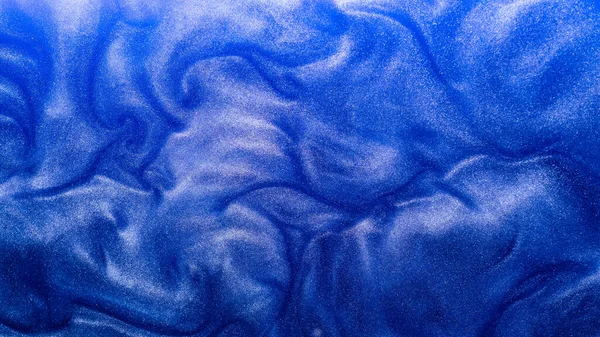 Paillettes fond grain texture mer vague encre bleu — Photo