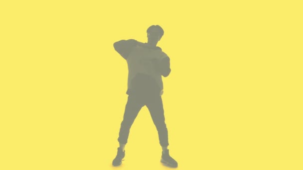 Doppia esposizione silhouette hip hop ballerino giallo — Video Stock